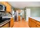 Kitchen with stainless steel appliances and hardwood flooring at 5240 Ochs Ave, Indianapolis, IN 46254