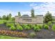 Stone sign for Westmoor of Noblesville community surrounded by lush landscaping at 5264 Veranda Dr, Noblesville, IN 46062