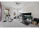Office space with multiple windows, multiple monitors, and exercise equipment at 5264 Veranda Dr, Noblesville, IN 46062