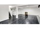 Spacious basement with unique flooring and stairs to the main floor at 5349 Culver St, Indianapolis, IN 46226