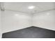 Unfinished basement with painted floor and white walls, ready for customization at 5349 Culver St, Indianapolis, IN 46226