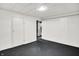 Spacious unfinished basement with painted floor and white walls, ready for customization at 5349 Culver St, Indianapolis, IN 46226