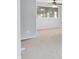 Open living space with new carpet, fresh paint, and abundant natural light from a large window at 5349 Culver St, Indianapolis, IN 46226