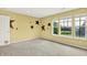 Bedroom with neutral walls, soft carpet, large windows, and fun star accents at 5598 W Woodstock Trl, McCordsville, IN 46055