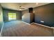 Large bonus room featuring neutral carpeting and a sliding glass door at 5861 N 330 W, Columbus, IN 47201
