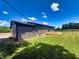 Back of home with a clear view of the deck, siding, and landscaping at 5861 N 330 W, Columbus, IN 47201