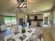 Bright kitchen and dining area with stainless appliances and seating for six at 5861 N 330 W, Columbus, IN 47201
