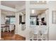 Kitchen bar with seating offering a pass-through view into a modern kitchen with updated appliances and plenty of light at 5939 Oberlies Way, Plainfield, IN 46168