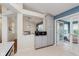 Bright kitchen featuring stainless appliances, pantry, granite counters, open floor plan, and adjacent study at 5939 Oberlies Way, Plainfield, IN 46168