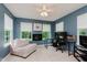 Cozy study with fireplace, lots of natural light, neutral walls, and a view of the backyard at 5939 Oberlies Way, Plainfield, IN 46168