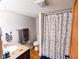 Cozy bathroom with modern fixtures, includes a stylish shower curtain and ample counter space at 6336 N Carroll Rd, Indianapolis, IN 46235
