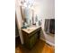 Well-lit bathroom featuring a granite vanity and decorative accents, exuding style and functionality at 6336 N Carroll Rd, Indianapolis, IN 46235