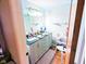 Bright bathroom with double sink vanity, modern lighting, and stylish decor; provides ample space and comfort at 6336 N Carroll Rd, Indianapolis, IN 46235
