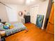 Comfortable bedroom with twin bed, dresser, and decorative mirror; a cozy, bright and inviting space at 6336 N Carroll Rd, Indianapolis, IN 46235