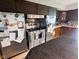 Modern kitchen with stainless steel appliances, updated countertops, and ample cabinetry at 6336 N Carroll Rd, Indianapolis, IN 46235