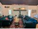Inviting living room with a brick fireplace and comfortable seating at 6336 N Carroll Rd, Indianapolis, IN 46235