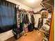 Organized walk-in closet with built-in shelving and storage solutions, maximizing space and convenience at 6336 N Carroll Rd, Indianapolis, IN 46235