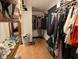 Spacious walk-in closet with ample shelving and clothing racks, ready for organization and storage at 6336 N Carroll Rd, Indianapolis, IN 46235