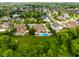 Panoramic aerial view showcasing the home's landscaped yard, and inviting swimming pool in a Gathering-friendly community at 6639 E Deerfield Dr, Zionsville, IN 46077