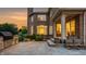 A well-appointed backyard patio with an outdoor kitchen and comfortable seating, perfect for entertaining at 6639 E Deerfield Dr, Zionsville, IN 46077