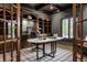 Beautiful home office with wood cabinets, marble top desk, and stylish decor at 6639 E Deerfield Dr, Zionsville, IN 46077