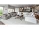 Bright and spacious living room with plush seating, modern decor, and an open floor plan at 6639 E Deerfield Dr, Zionsville, IN 46077