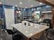 Well-lit kitchen with gray cabinets, stainless steel appliances, and a granite-topped island with seating at , Lebanon, IN 46052