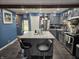 Spacious kitchen with gray cabinets, stainless steel appliances, a granite-topped island, and open layout at , Lebanon, IN 46052