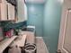 Functional laundry room with washer, dryer, cabinets, and 'Wash/Fold' wall decor at , Lebanon, IN 46052