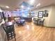 Spacious basement with a full bar, a game table, and pub decor at 7823 Ashtree Dr, Indianapolis, IN 46259