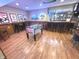 Basement includes foosball table, bar area and pub themed decor at 7823 Ashtree Dr, Indianapolis, IN 46259