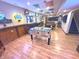 Wide angle shot of basement including bar area, games and tv area and stairs at 7823 Ashtree Dr, Indianapolis, IN 46259