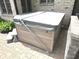 Covered hot tub for relaxation and privacy in the backyard at 7823 Ashtree Dr, Indianapolis, IN 46259