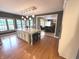 Spacious kitchen with seating at the island and an adjacent living area, perfect for modern living at 7823 Ashtree Dr, Indianapolis, IN 46259