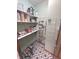 Well-stocked pantry with organized shelving and ample storage space for all your grocery needs at 7823 Ashtree Dr, Indianapolis, IN 46259