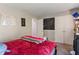 Well-lit bedroom features a comfortable bed and ample storage with an organized interior at 8376 Glen Highlands Dr, Indianapolis, IN 46236