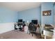 Bright office/bedroom with dual desk setup and soothing blue walls at 8376 Glen Highlands Dr, Indianapolis, IN 46236