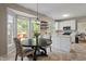 Eat-in kitchen with a view of the deck, plus stainless steel appliances at 8376 Glen Highlands Dr, Indianapolis, IN 46236