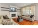 Inviting living room features a fireplace and comfortable seating at 8376 Glen Highlands Dr, Indianapolis, IN 46236