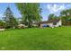 Expansive backyard featuring lush greenery and a charming gazebo, perfect for outdoor enjoyment at 9130 E 18Th St, Indianapolis, IN 46229