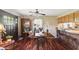 Charming dining area with natural light, a wooden table, stylish decor, and access to the living area at 9130 E 18Th St, Indianapolis, IN 46229