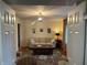 Cozy living room with plush sofa and coffee table, viewed from doorway at 9510 Copley Dr, Indianapolis, IN 46260