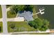 Desirable waterfront property featuring a spacious lawn, long driveway, and private boat dock at 101 Edgewater Dr, Noblesville, IN 46062