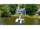 Beautiful waterfront home with a private boat dock and lift, set on a well-manicured lawn and mature trees at 101 Edgewater Dr, Noblesville, IN 46062