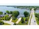 Desirable waterfront property with mature trees, lush lawn, and easy access to nearby amenities at 101 Edgewater Dr, Noblesville, IN 46062