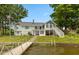 Stunning waterfront home with a private dock and charming lakeside architecture at 101 Edgewater Dr, Noblesville, IN 46062