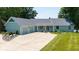 Charming single-story home featuring an attached two-car garage, well-kept lawn, and beautiful landscaping at 101 Edgewater Dr, Noblesville, IN 46062