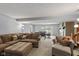 Spacious living area with fireplace, comfortable sectional, and access to outdoor space at 101 Edgewater Dr, Noblesville, IN 46062