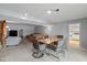 Open-concept living area with dining space, comfortable seating, and abundant natural light at 101 Edgewater Dr, Noblesville, IN 46062