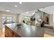 Open concept living room featuring a fireplace, high ceiling and beautiful skylights at 101 Edgewater Dr, Noblesville, IN 46062
